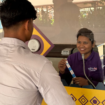 Ticket counter showing college id to get benefit of college id offer