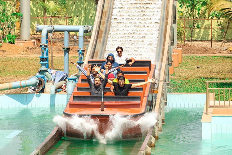 Enjoying ride at Wet'nJoy Water park & Amusement park Lonavala